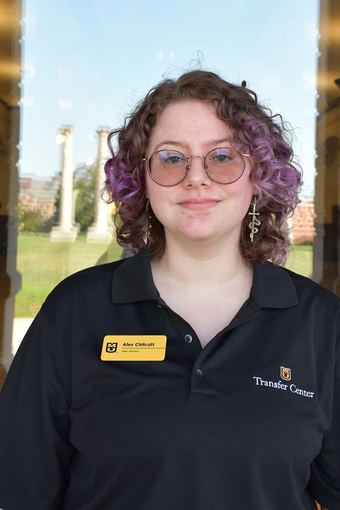 Headshot of Alex Chilcutt, a peer advisor at the University of Missouri, smiling in a black polo shirt.