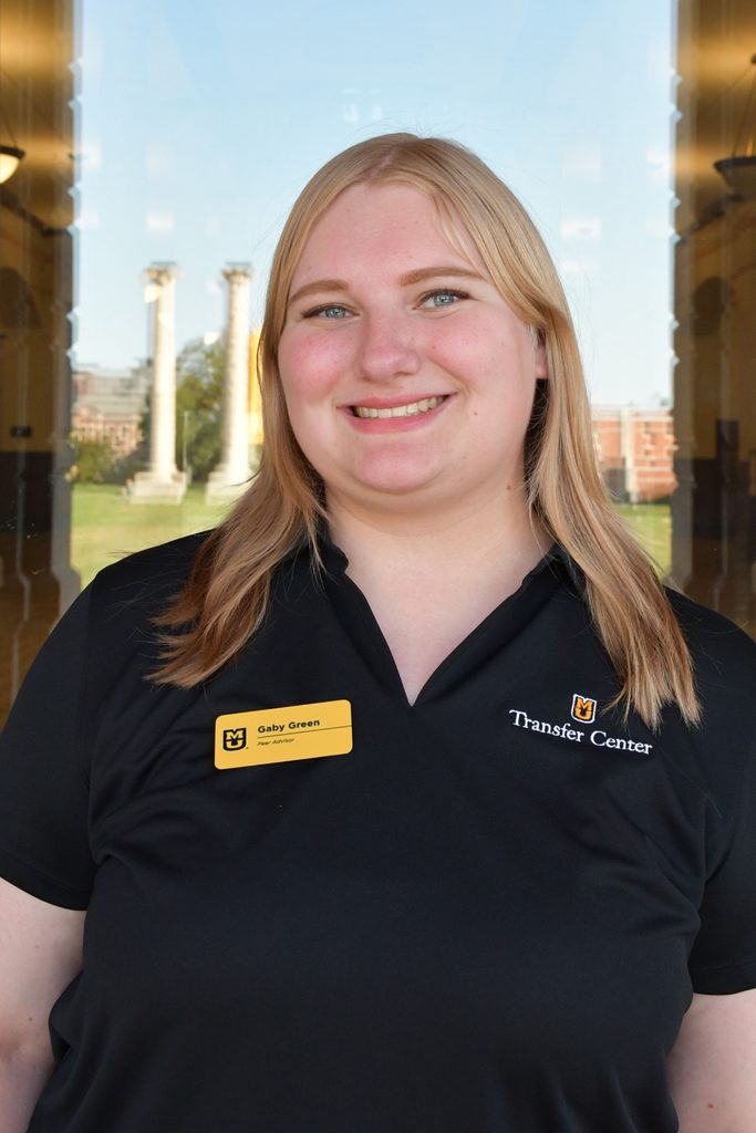 Headshot of Gabby Green, a peer advisor at the University of Missouri, smiling in a black polo shirt.