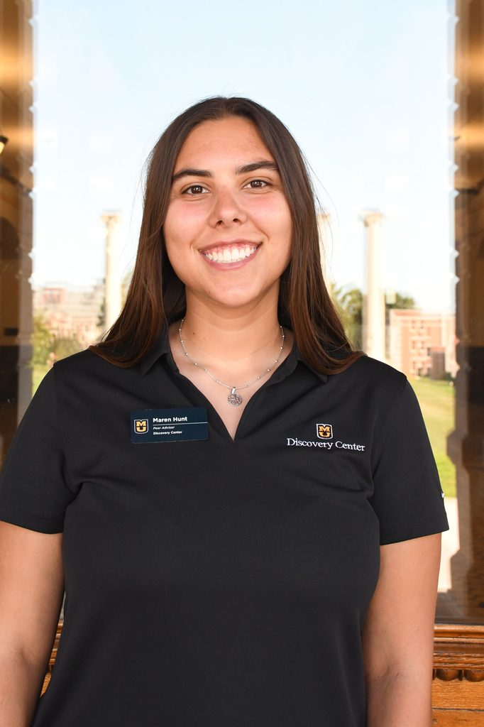 Headshot of Maren Hunt, a peer advisor at the University of Missouri, smiling in a black polo shirt.